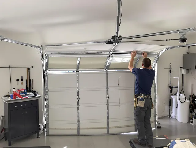 Ocala Garage Door Repair specialist performing precise section replacement on Ocala garage door