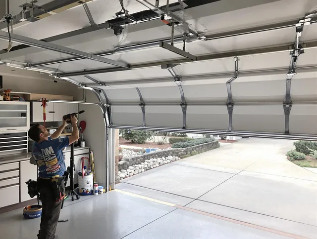 Garage door track repair service by Ocala Garage Door Repair in Ocala